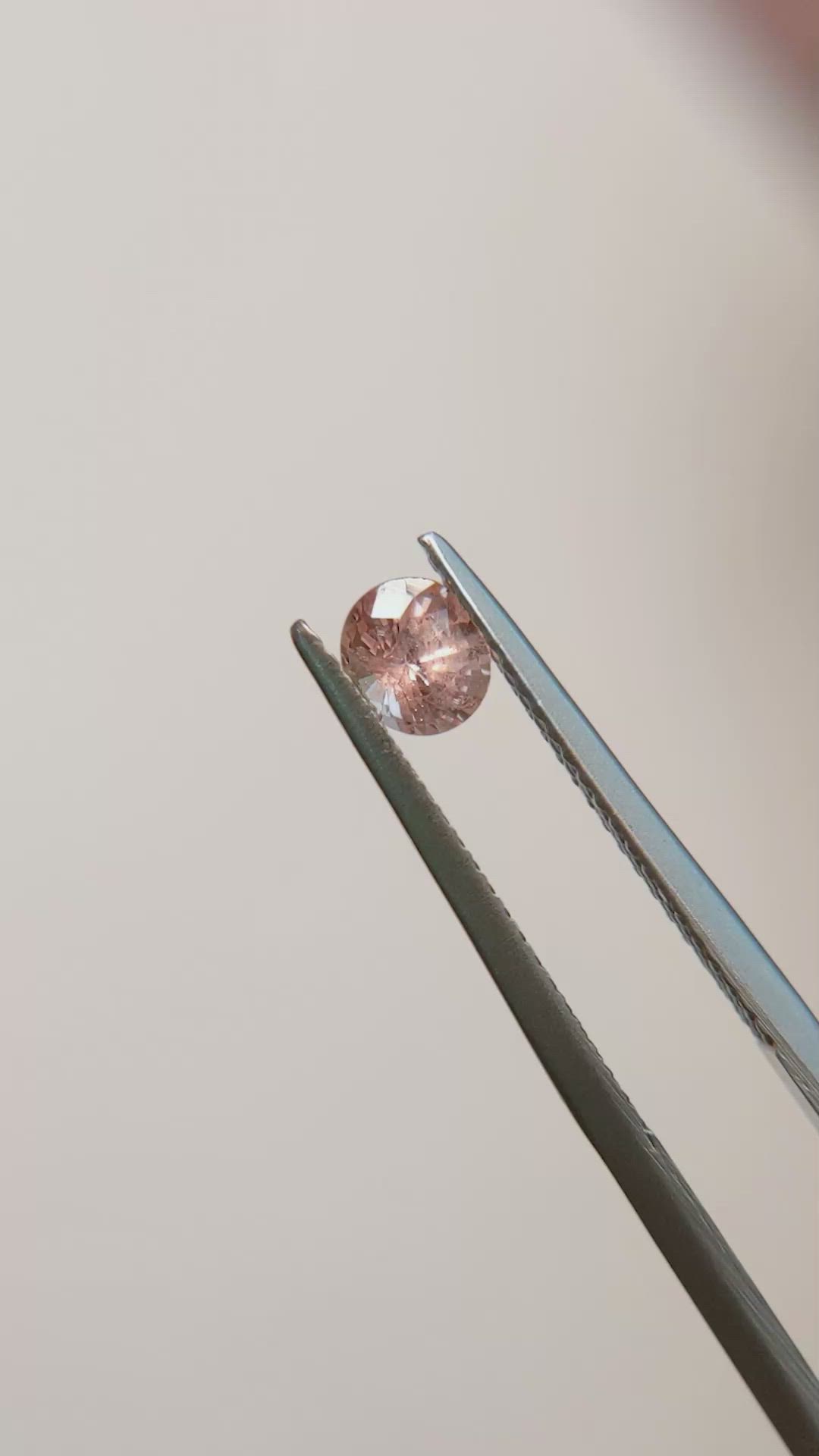 0.56 Ct. Peach Sapphire from Madagascar Size Video
