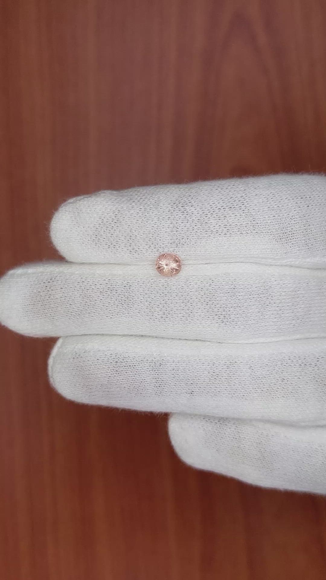 0.56 Ct. Peach Sapphire from Madagascar Size Video