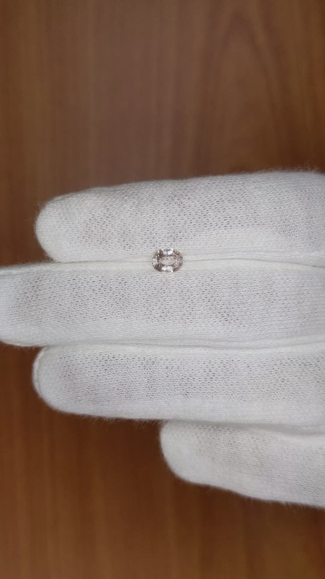 0.49 Ct. Peach Sapphire from Madagascar Size Video