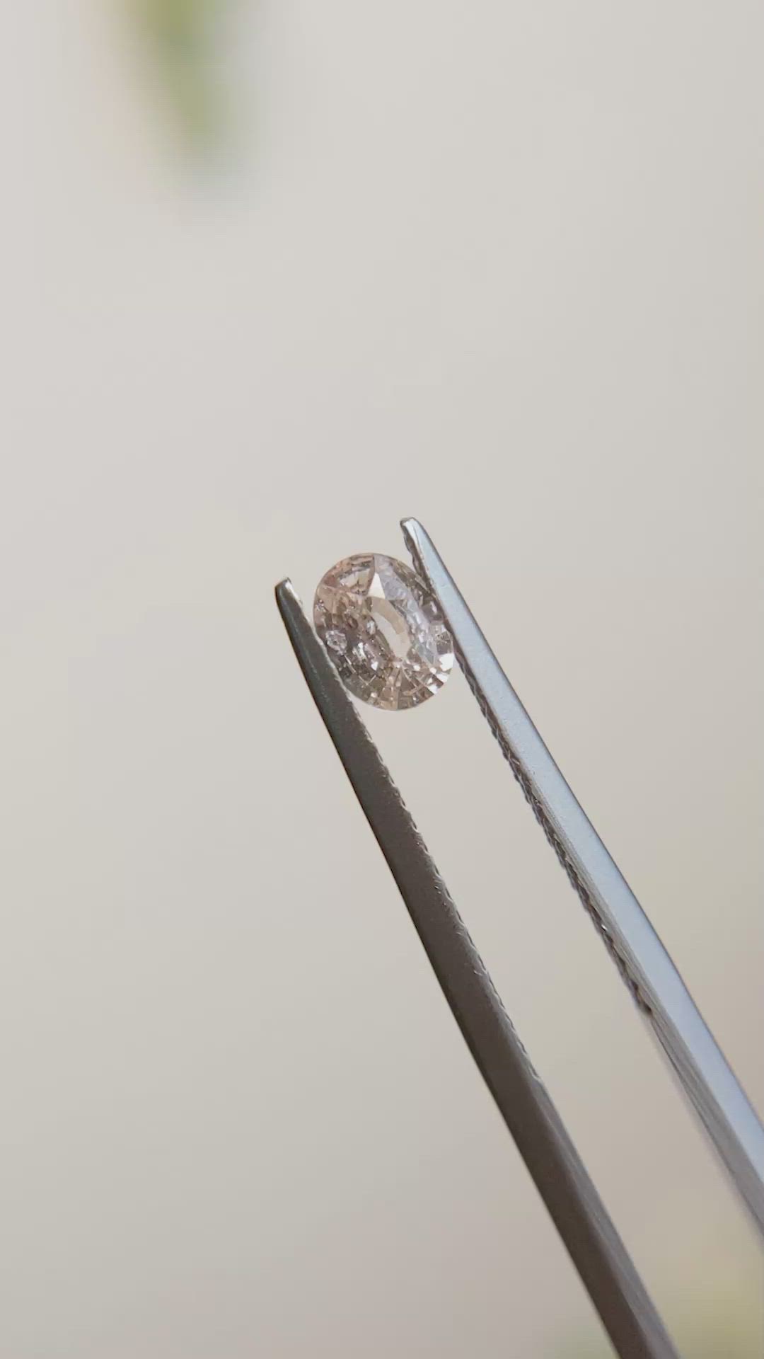 0.49 Ct. Peach Sapphire from Madagascar Size Video