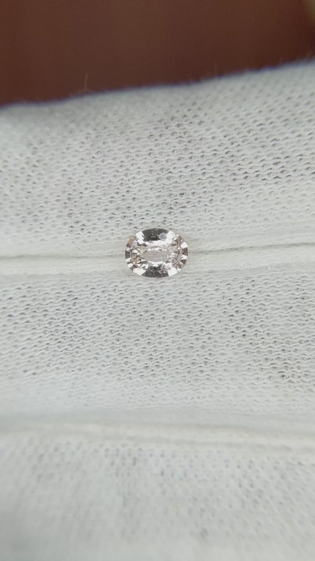 0.49 Ct. Peach Sapphire from Madagascar Size Video