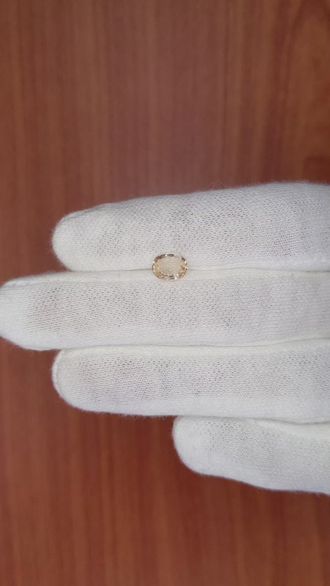 0.99 Ct. Peach Sapphire from Madagascar Size Video