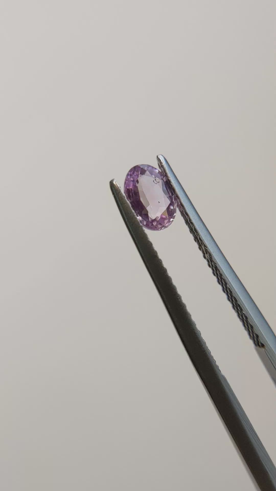 0.61 Ct. Pinkish Purple Sapphire from Madagascar Size Video