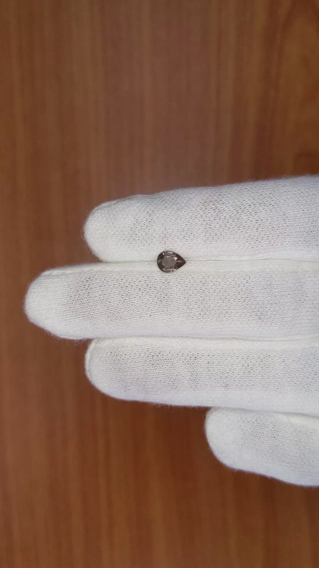 0.40 Ct. Greenish Brown Sapphire from Madagascar Size Video
