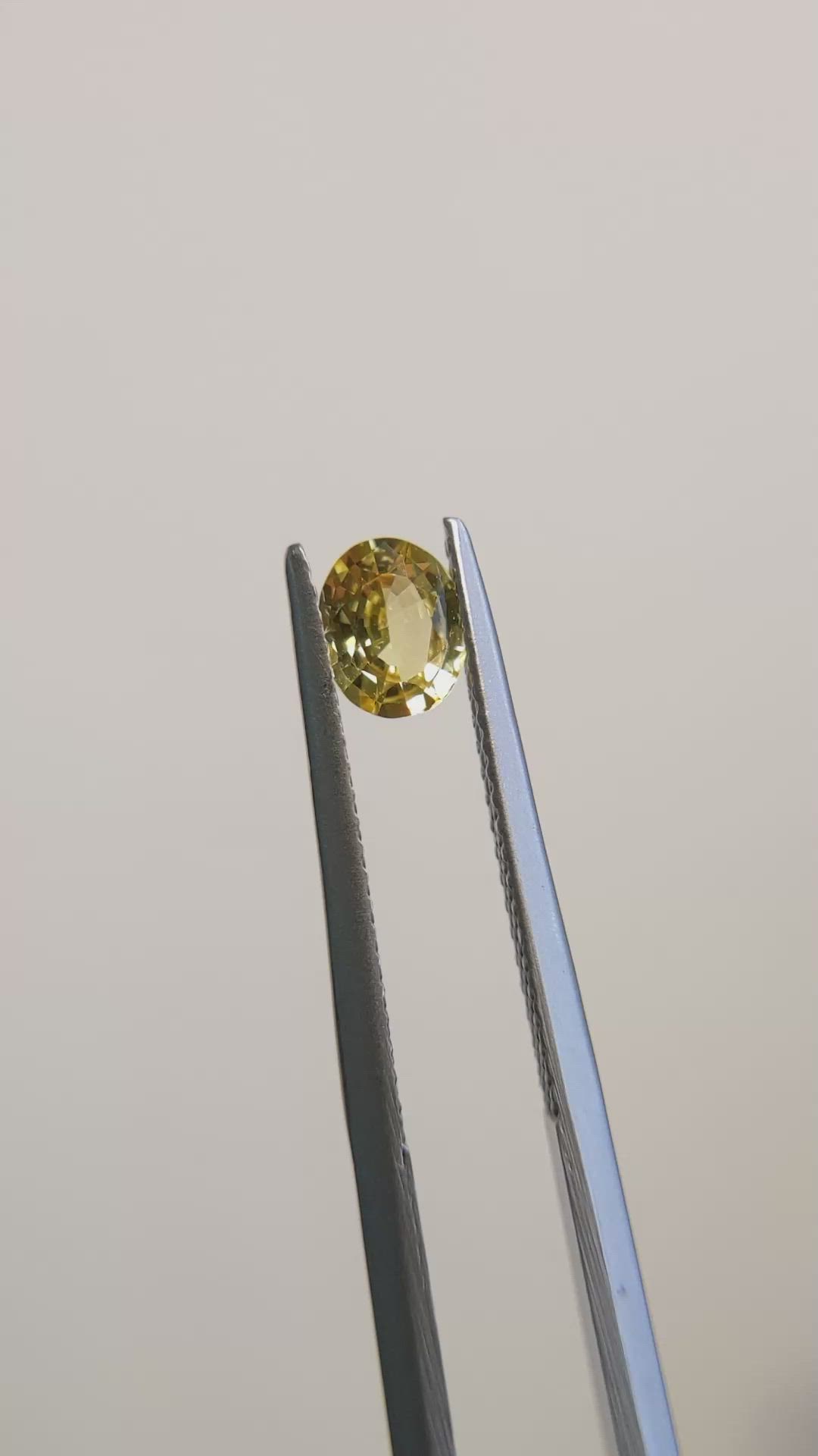0.59 Ct. Orangish Yellow Sapphire from Madagascar Size Video