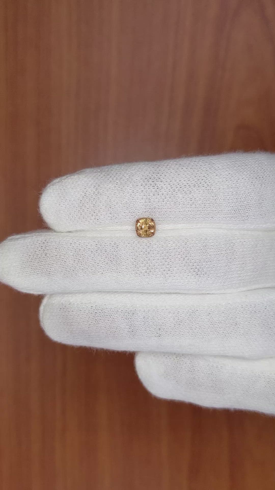 0.59 Ct. Orangish Brown Sapphire from Madagascar Size Video