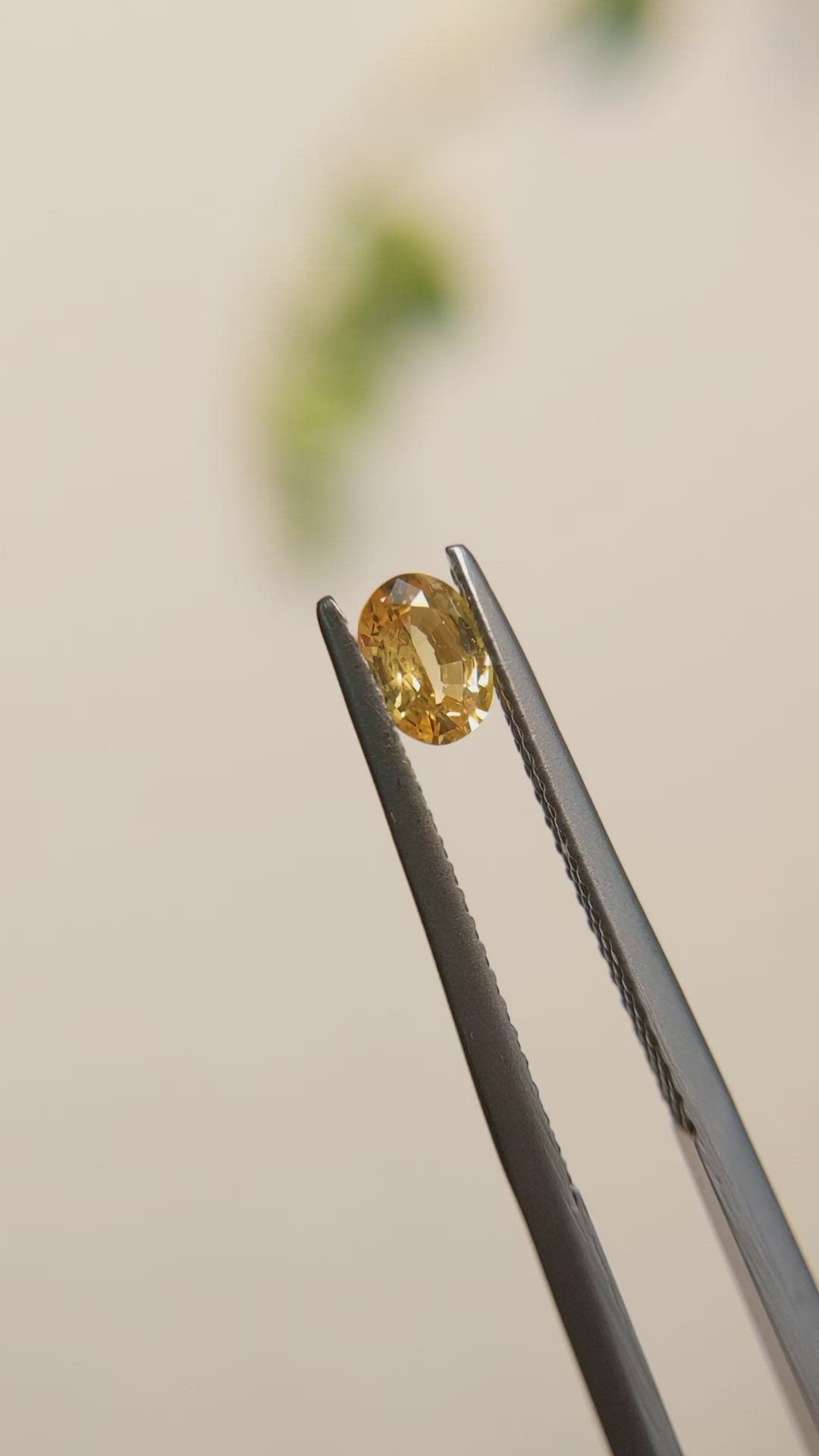 0.44 Ct. Orangish Yellow Sapphire from Madagascar Size Video