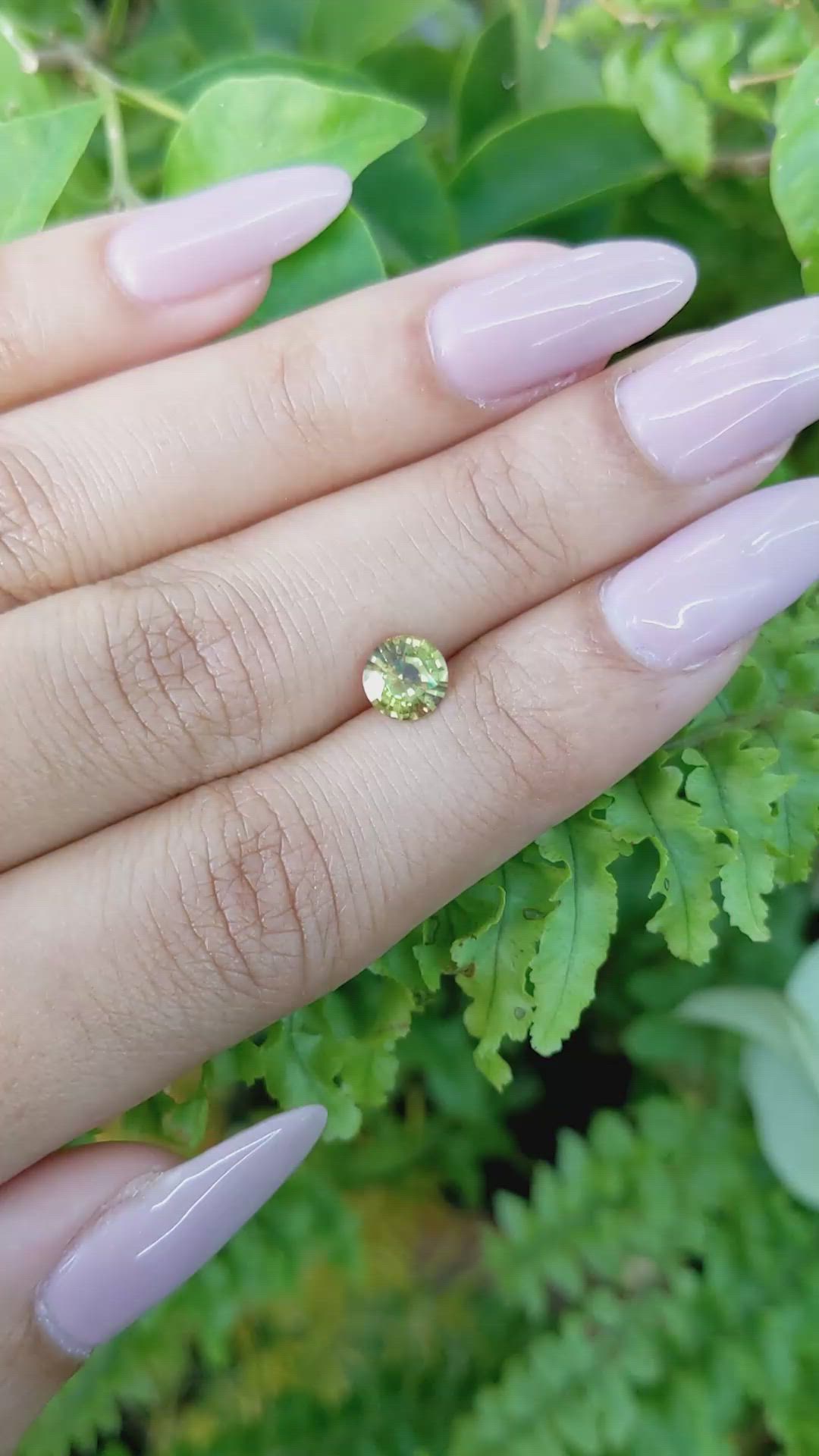 0.88 Ct. Yellowish Green Sapphire from Ceylon (Sri Lanka) Size Video