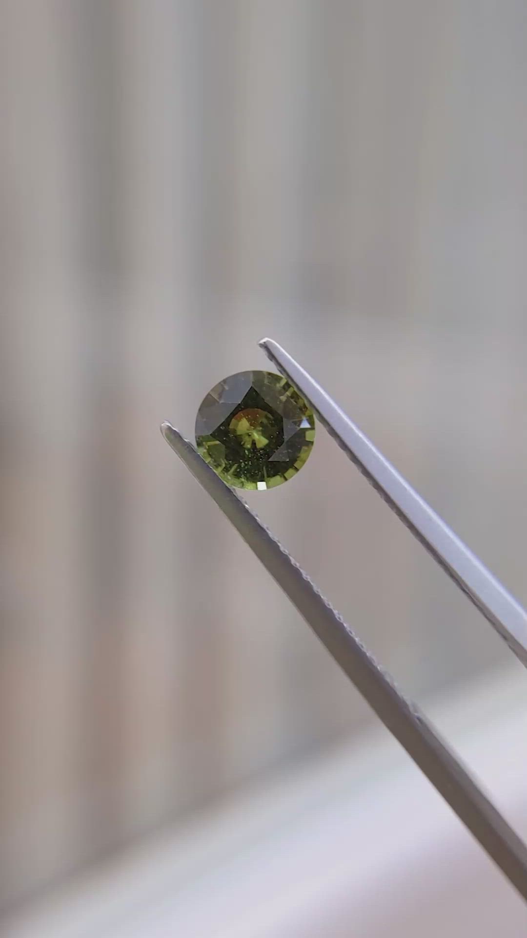0.88 Ct. Yellowish Green Sapphire from Ceylon (Sri Lanka) Size Video