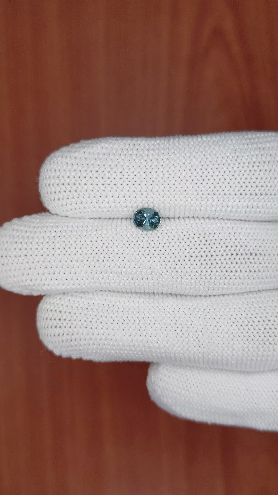 0.68 Ct. Bluish Green Sapphire from Madagascar Size Video