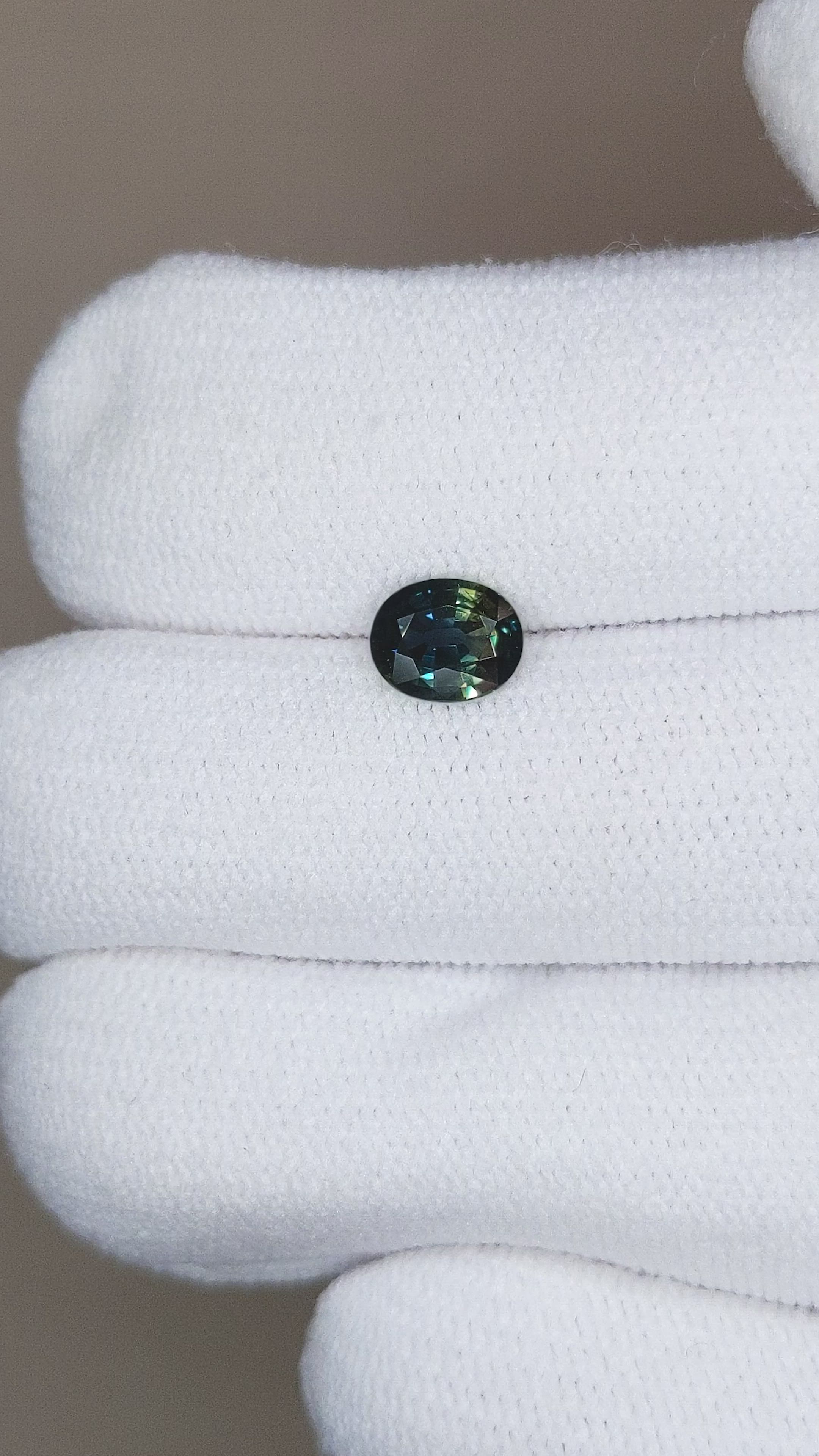 0.77 Ct. Bluish Green Sapphire from Madagascar Size Video