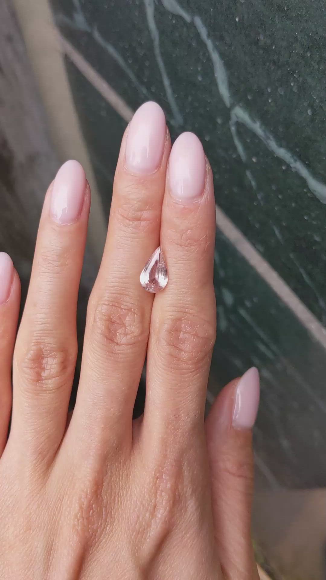 2.58 Ct. Peach Sapphire from Ceylon (Sri Lanka) Size Video