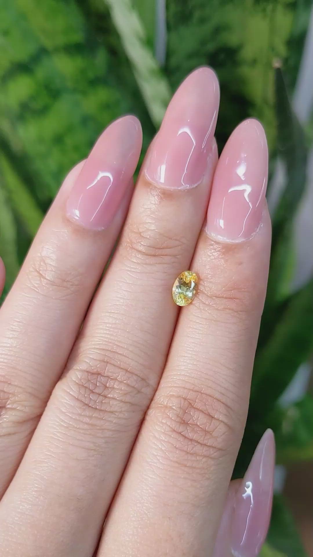 0.60 Ct. Orangish Yellow Sapphire from Ceylon (Sri Lanka) Size Video