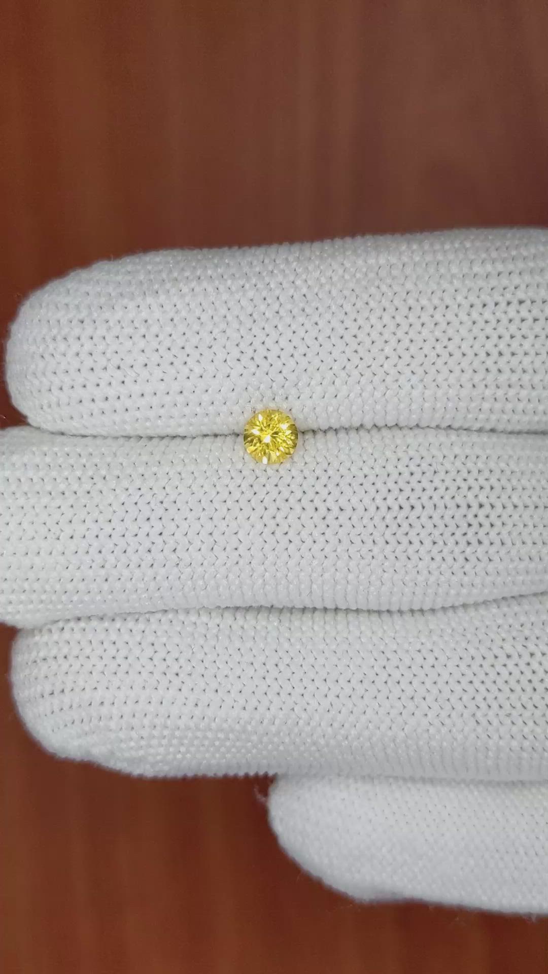 0.46 Ct. Orangish Yellow Sapphire from Ceylon (Sri Lanka) Size Video