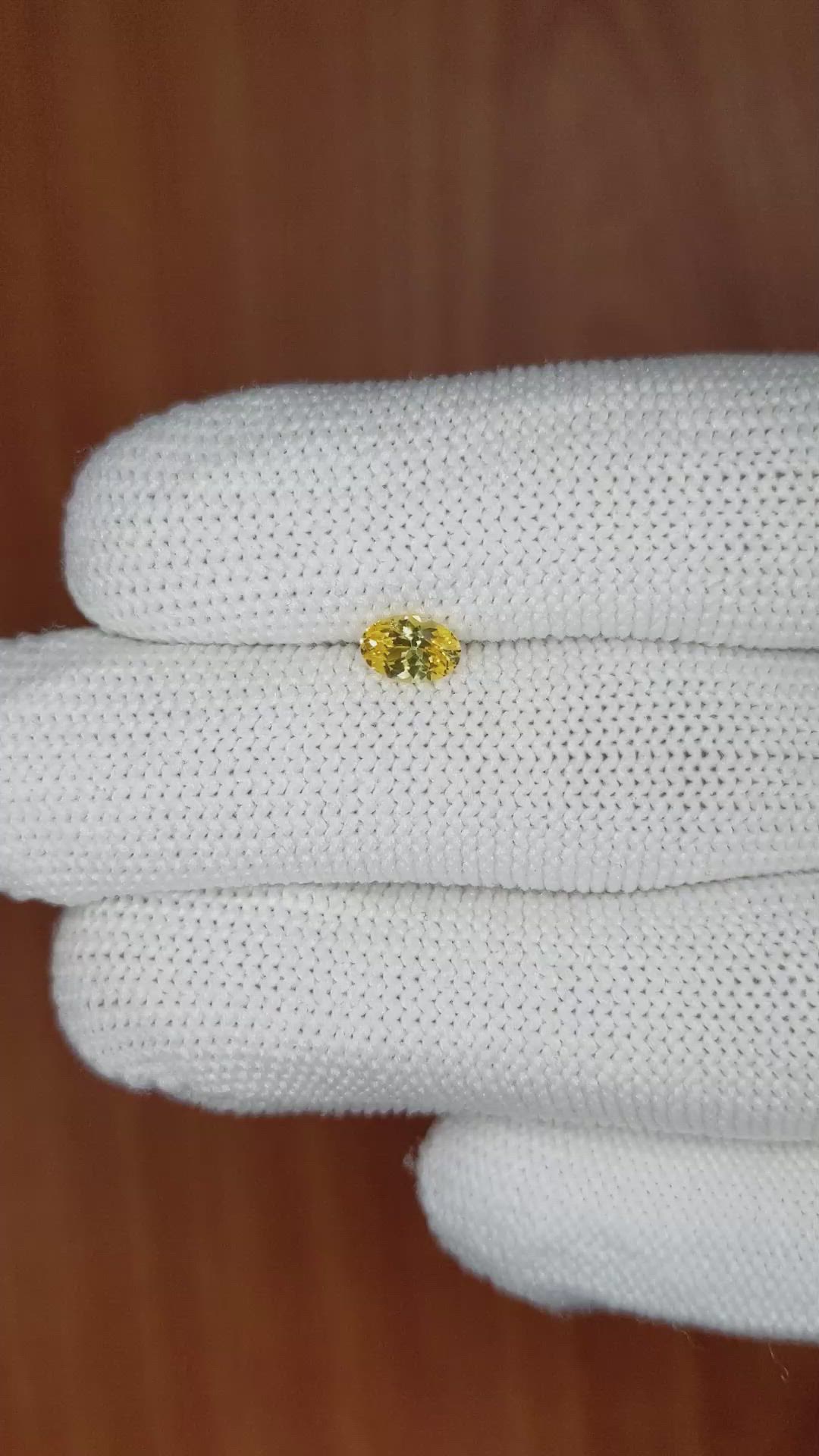 0.50 Ct. Orangish Yellow Sapphire from Ceylon (Sri Lanka) Size Video