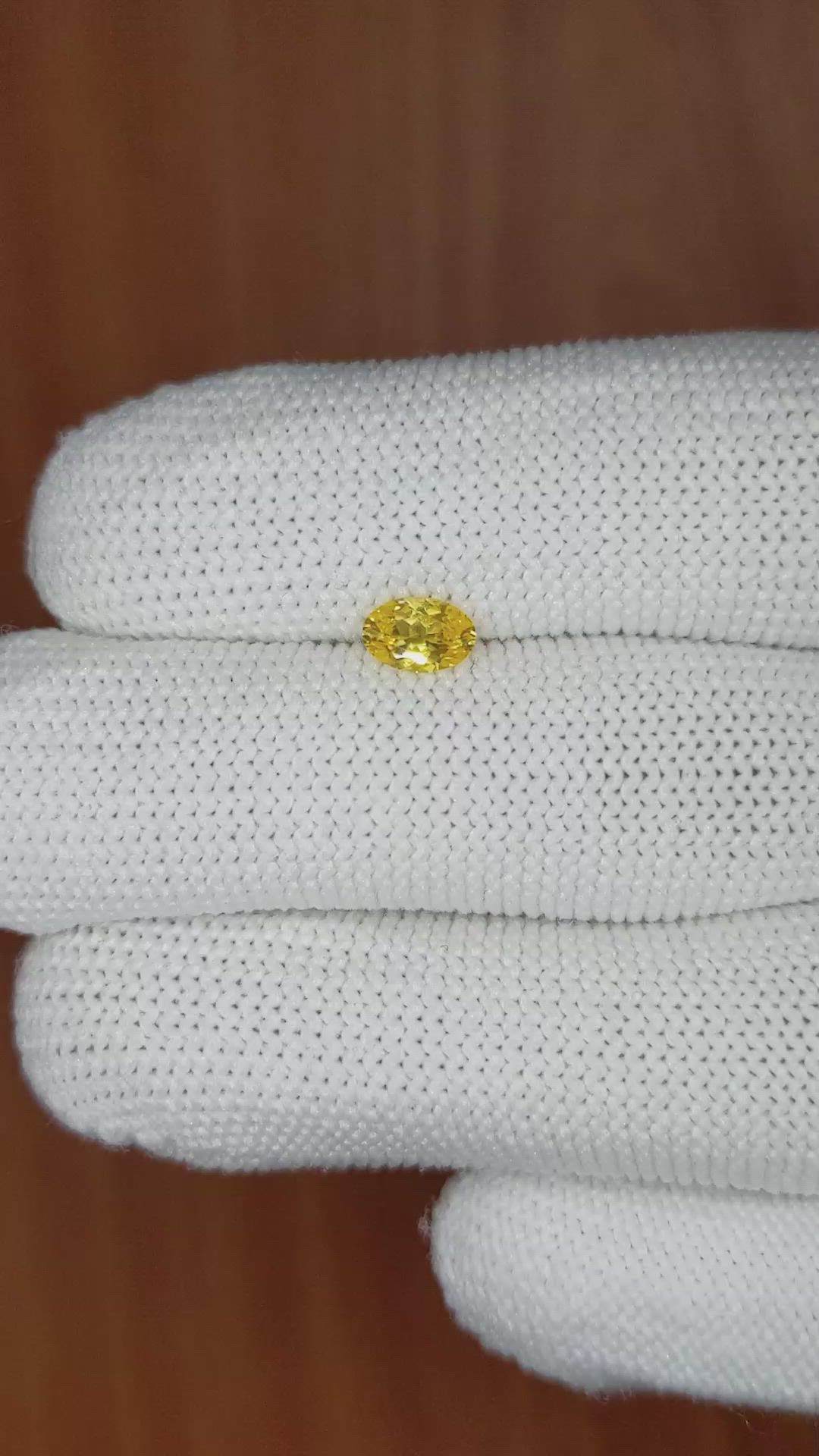 0.51 Ct. Orangish Yellow Sapphire from Ceylon (Sri Lanka) Size Video
