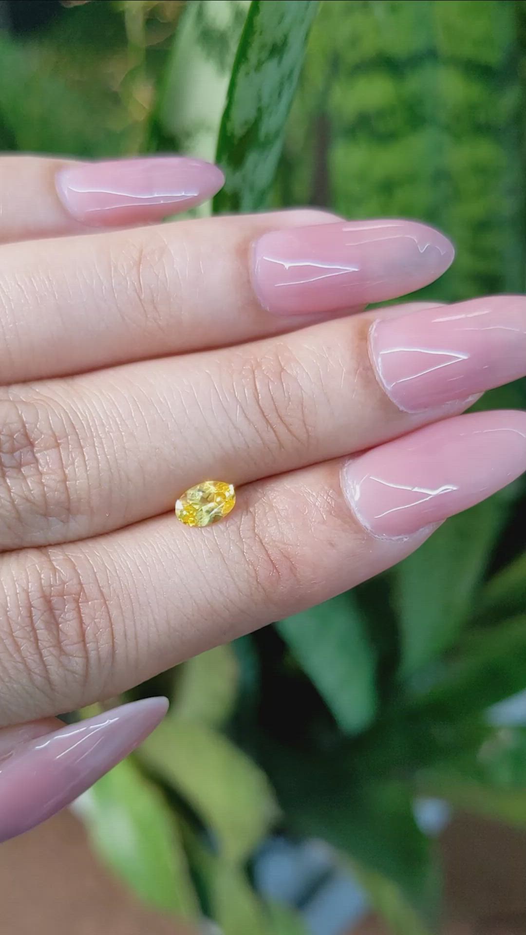 0.51 Ct. Orangish Yellow Sapphire from Ceylon (Sri Lanka) Size Video