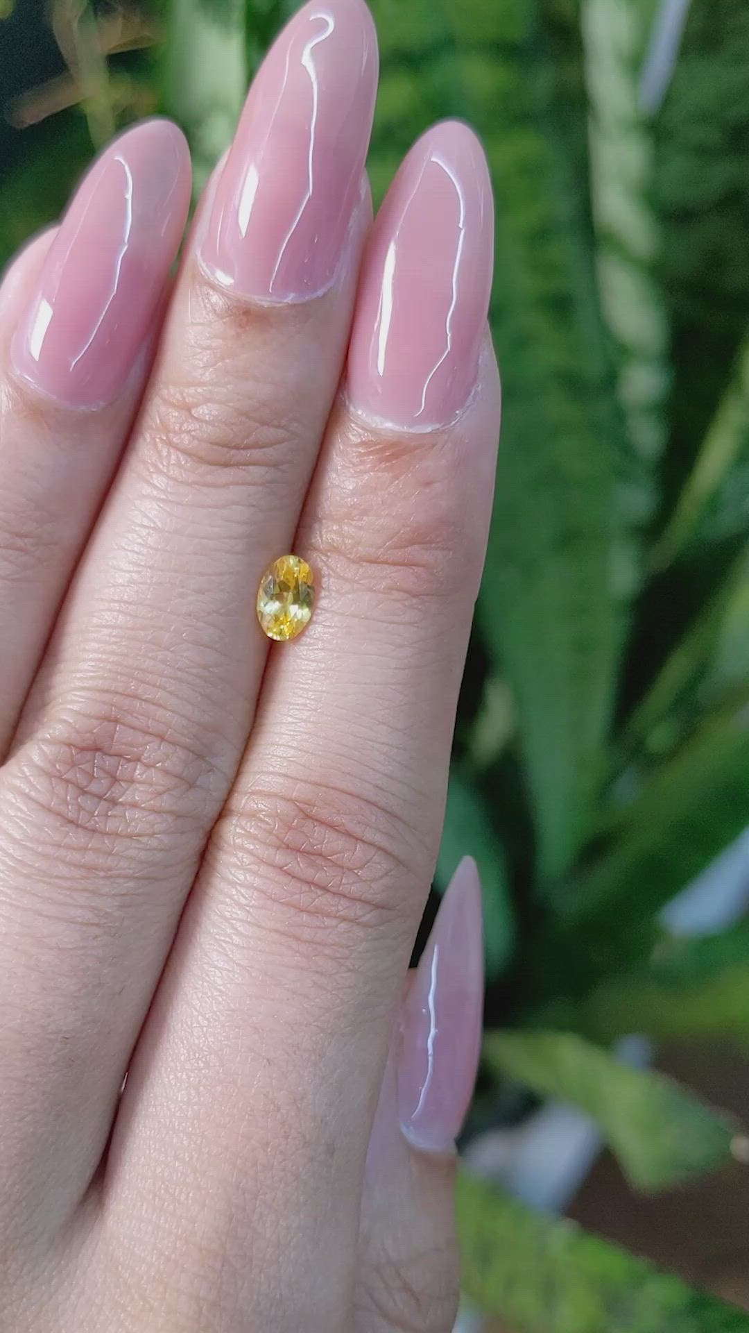 0.51 Ct. Orangish Yellow Sapphire from Ceylon (Sri Lanka) Size Video