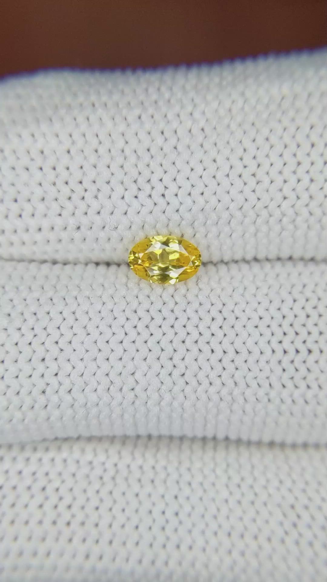 0.51 Ct. Orangish Yellow Sapphire from Ceylon (Sri Lanka) Size Video
