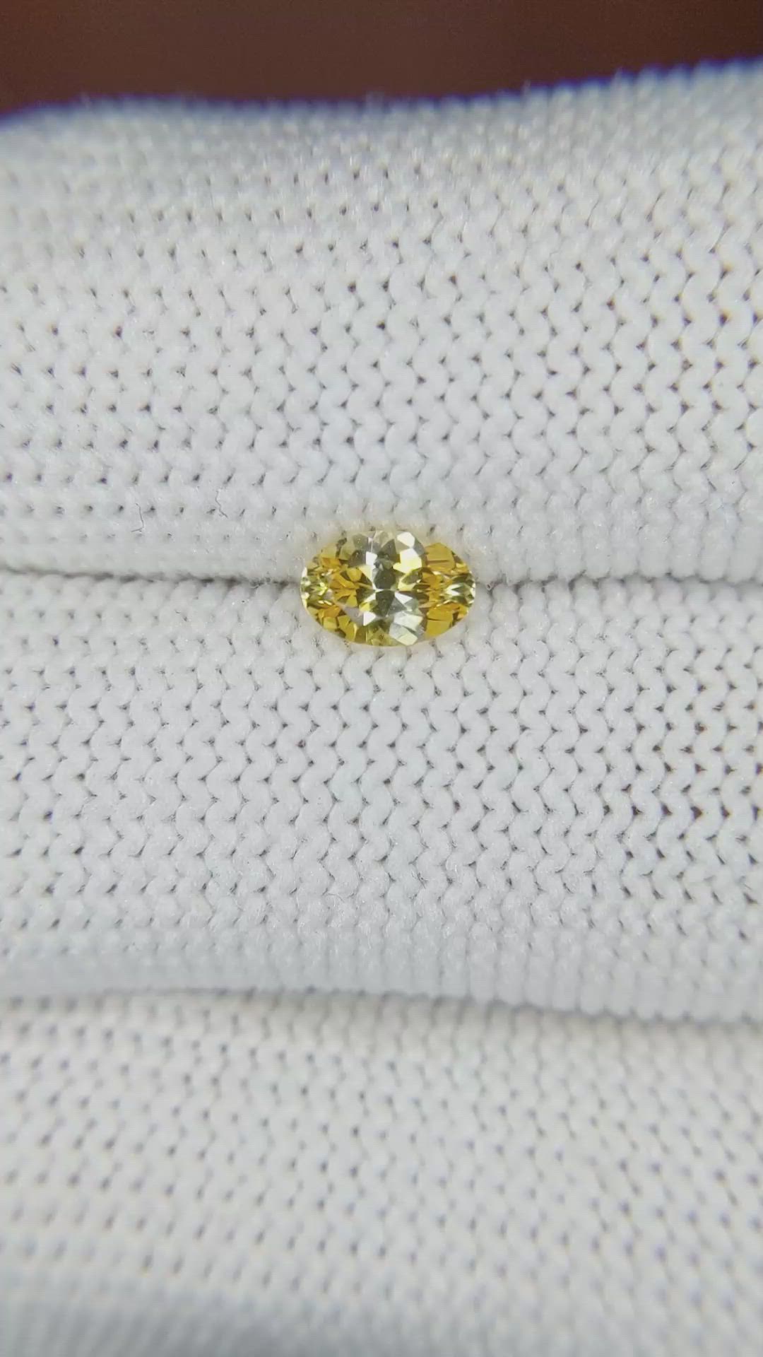 0.56 Ct. Orangish Yellow Sapphire from Ceylon (Sri Lanka) Size Video