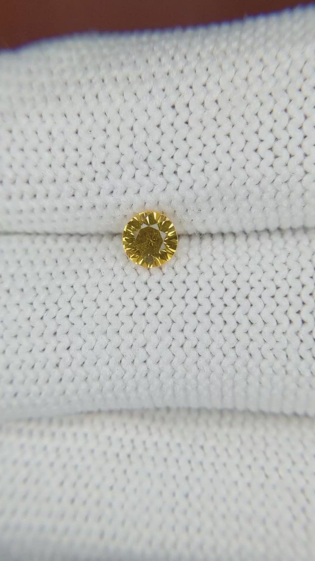 0.46 Ct. Orangish Yellow Sapphire from Ceylon (Sri Lanka) Size Video