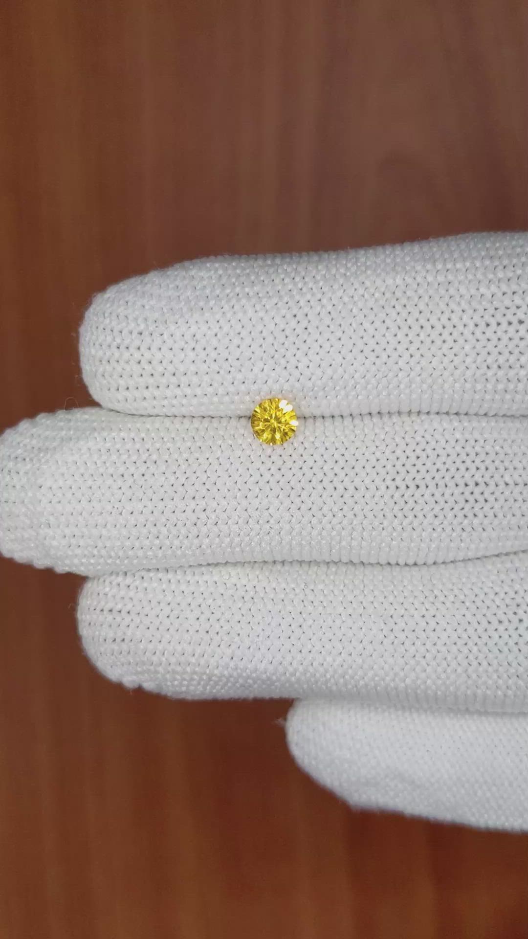 0.46 Ct. Orangish Yellow Sapphire from Ceylon (Sri Lanka) Size Video