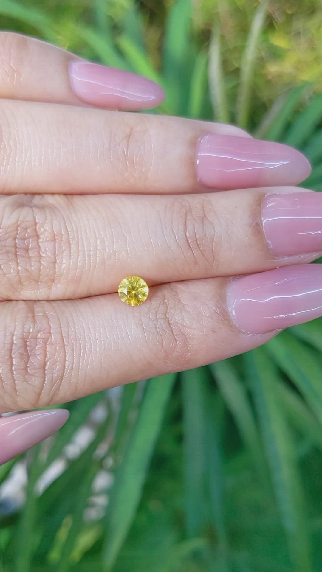0.46 Ct. Orangish Yellow Sapphire from Ceylon (Sri Lanka) Size Video