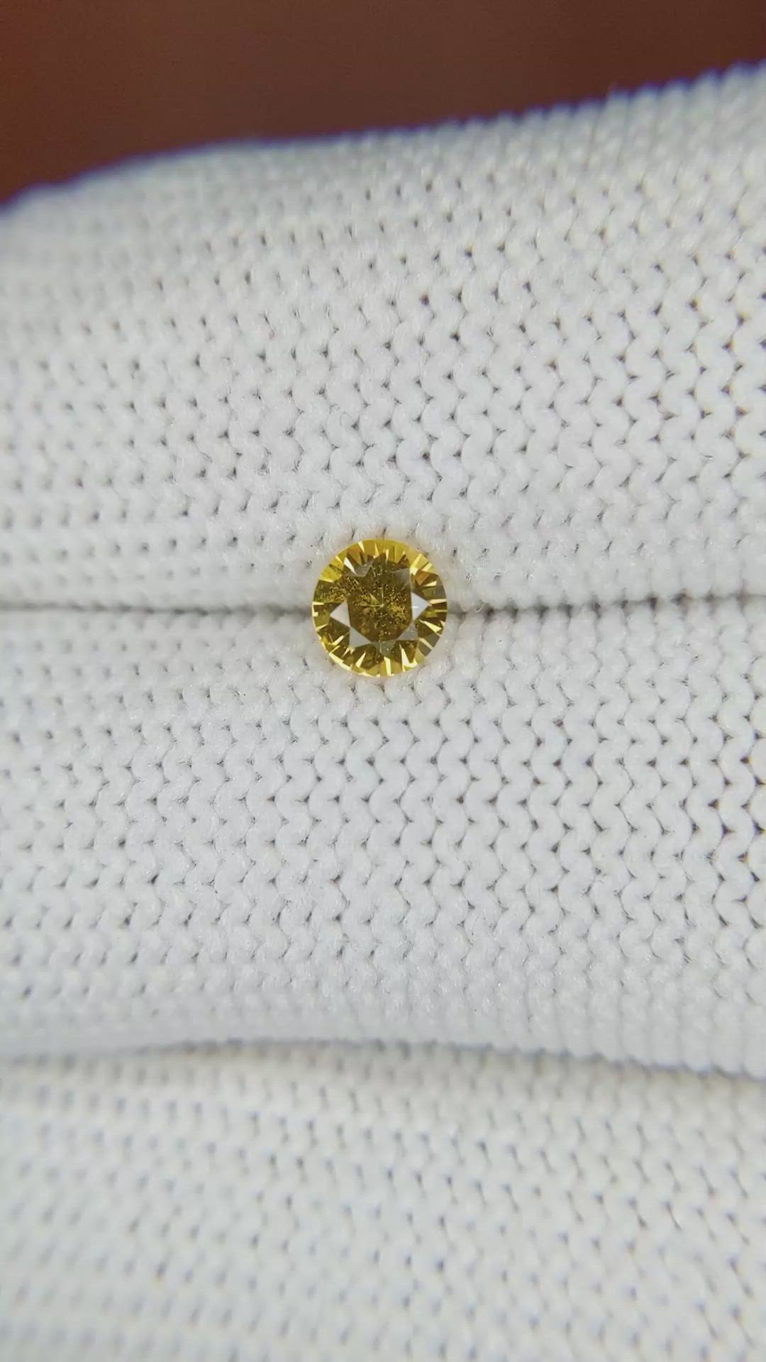 0.41 Ct. Orangish Yellow Sapphire from Ceylon (Sri Lanka) Size Video