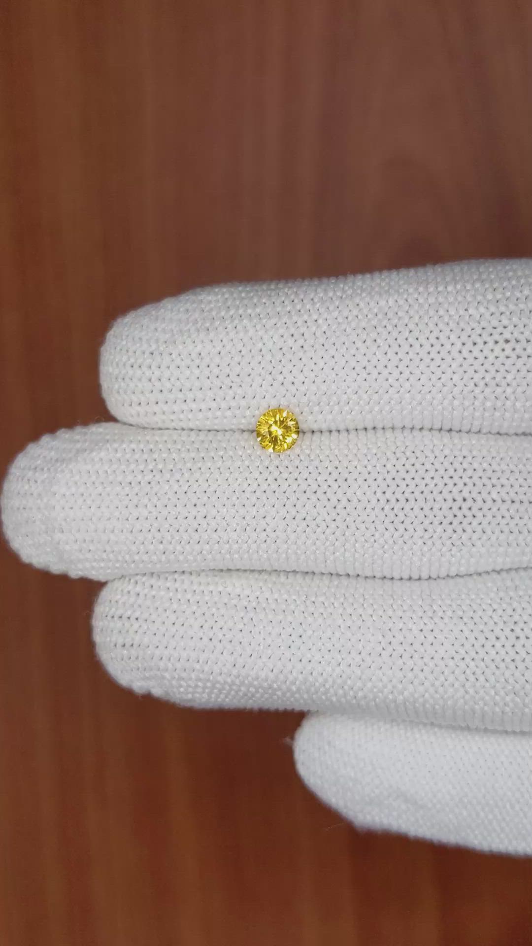 0.41 Ct. Orangish Yellow Sapphire from Ceylon (Sri Lanka) Size Video