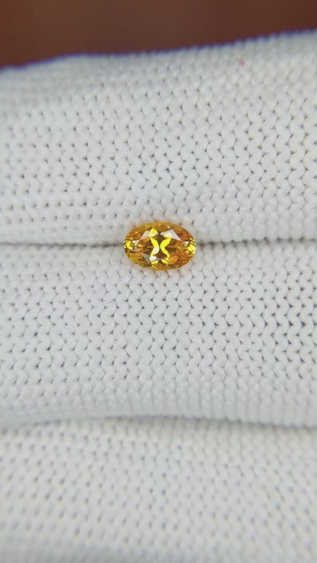 0.56 Ct. Yellowish Orange Sapphire from Ceylon (Sri Lanka) Size Video