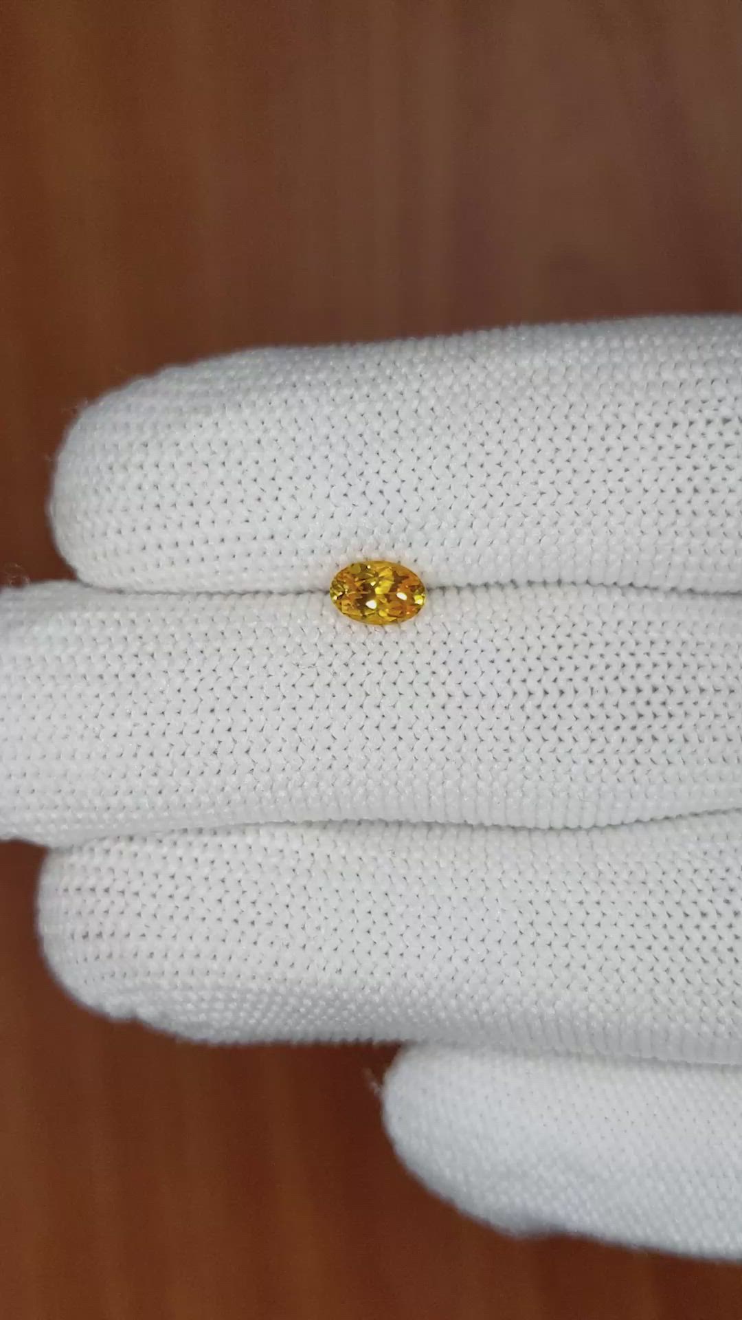 0.56 Ct. Yellowish Orange Sapphire from Ceylon (Sri Lanka) Size Video