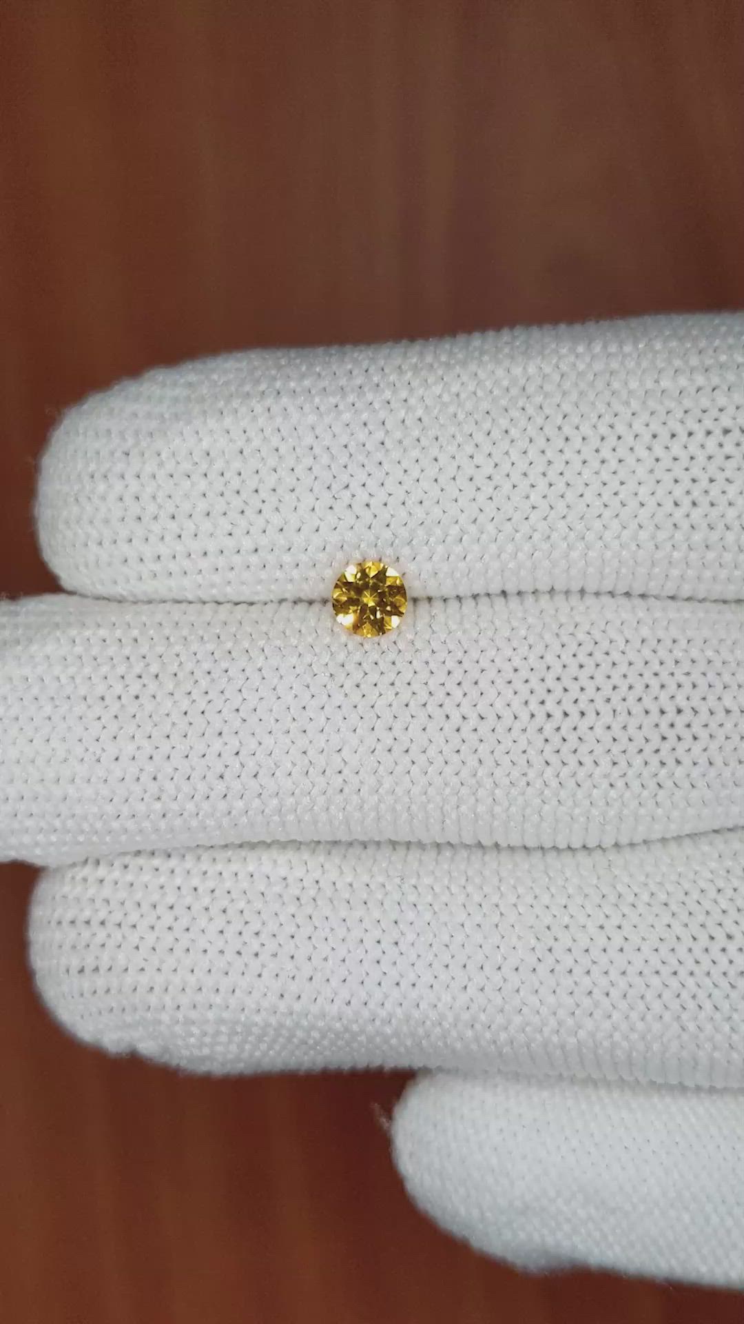 0.42 Ct. Orangish Yellow Sapphire from Ceylon (Sri Lanka) Size Video