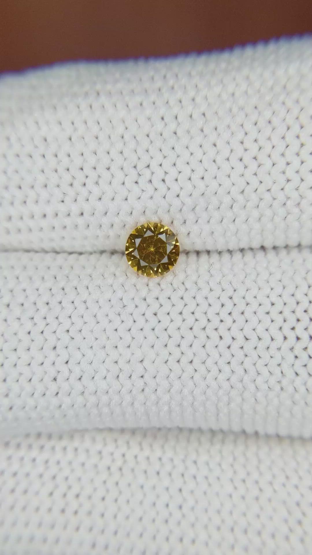 0.42 Ct. Orangish Yellow Sapphire from Ceylon (Sri Lanka) Size Video