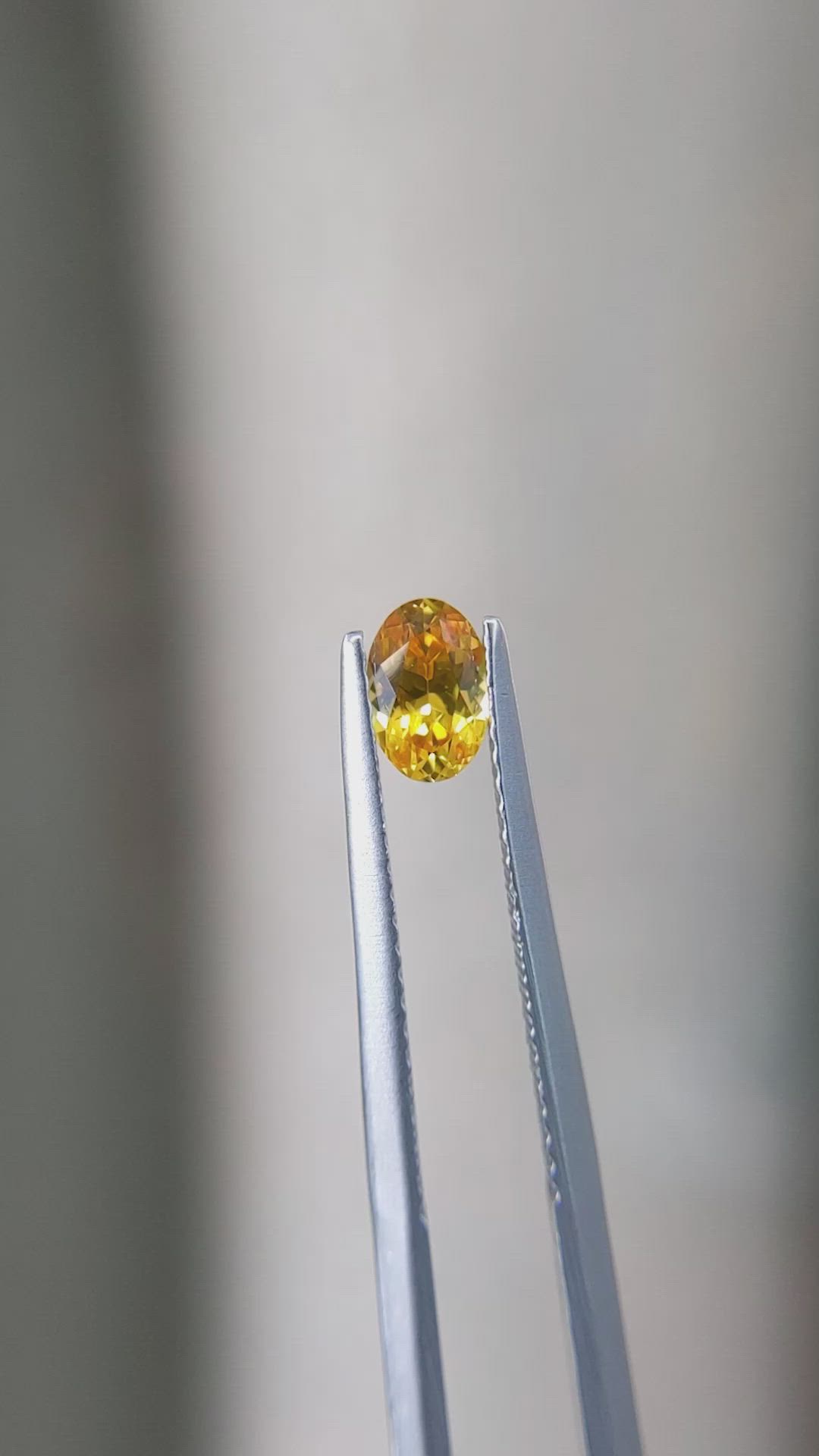 0.61 Ct. Orangish Yellow Sapphire from Ceylon (Sri Lanka) Size Video