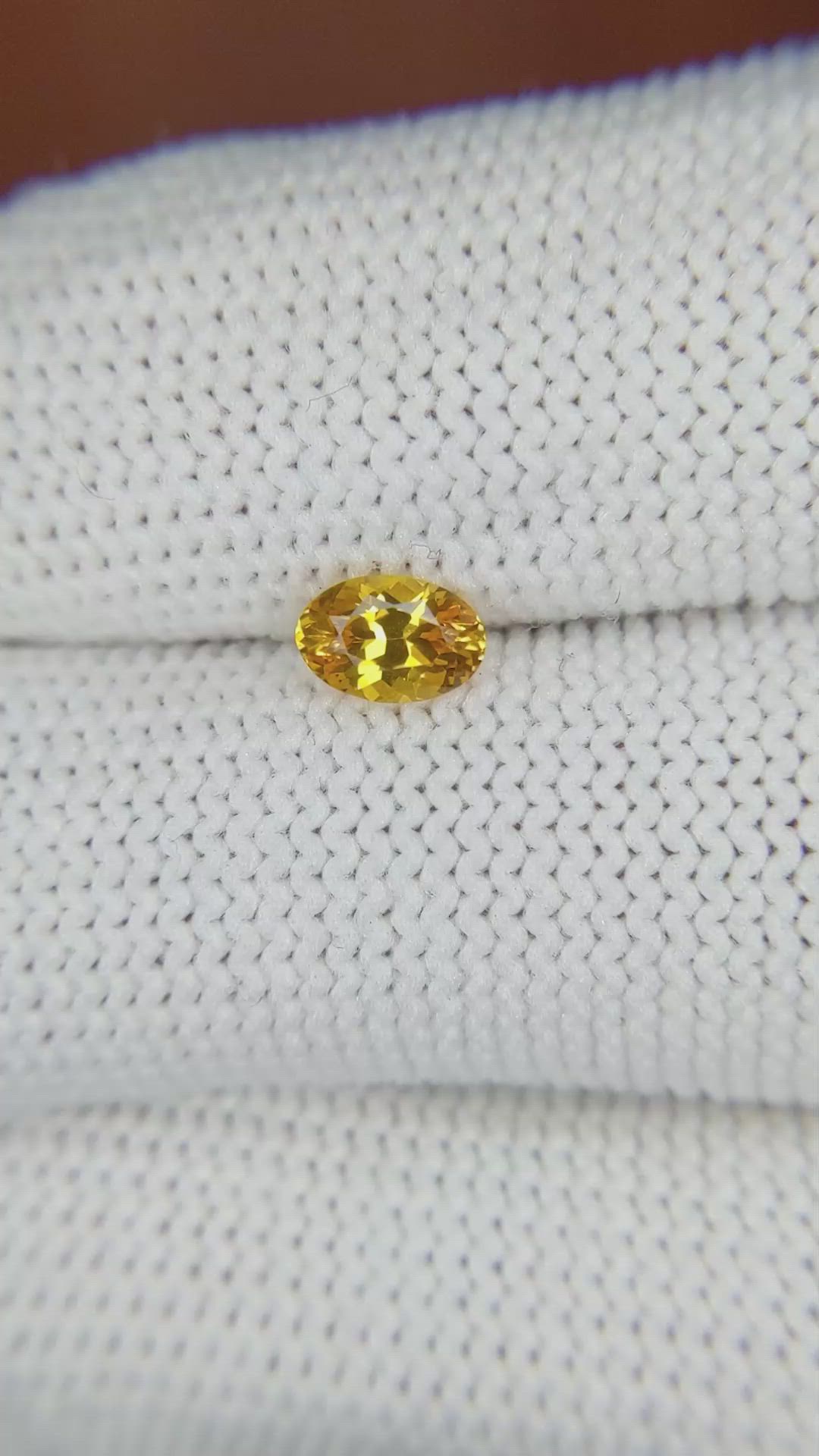 0.57 Ct. Orangish Yellow Sapphire from Ceylon (Sri Lanka) Size Video