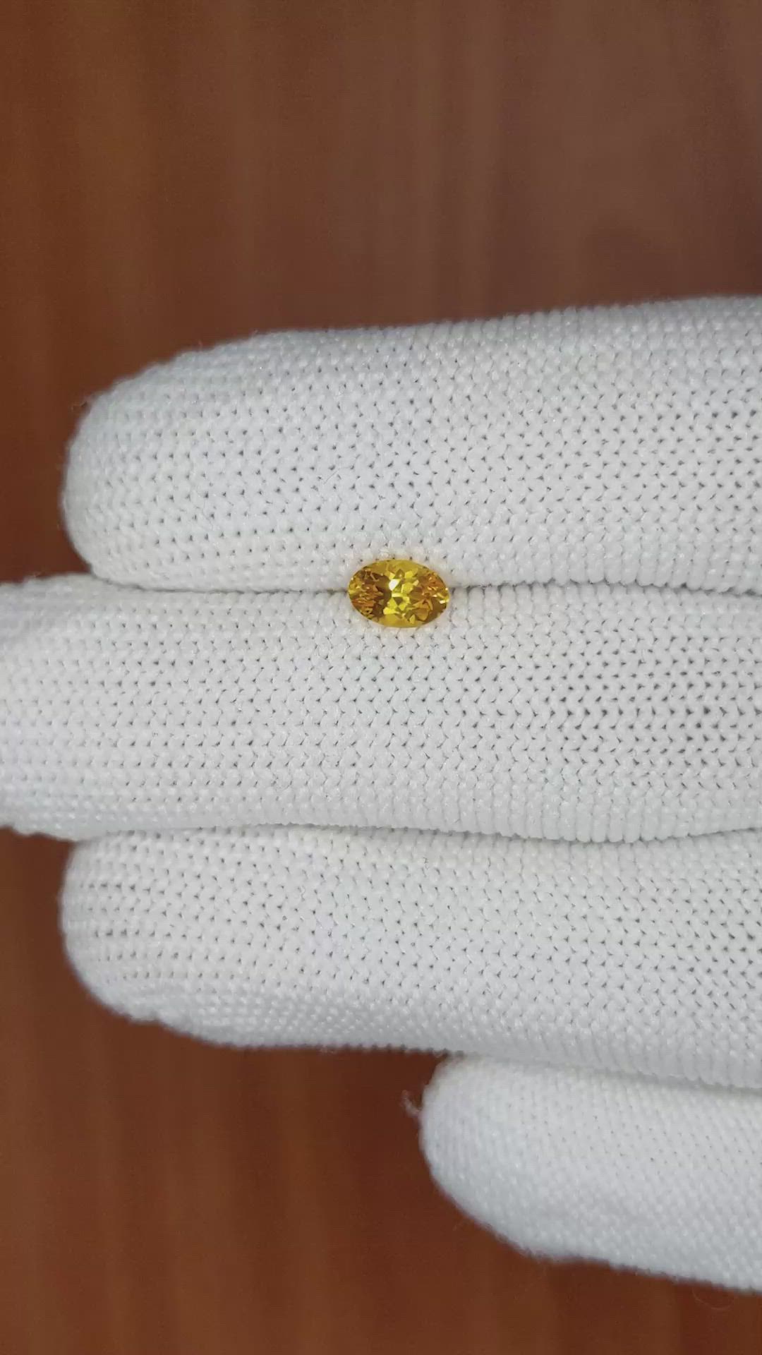 0.57 Ct. Orangish Yellow Sapphire from Ceylon (Sri Lanka) Size Video