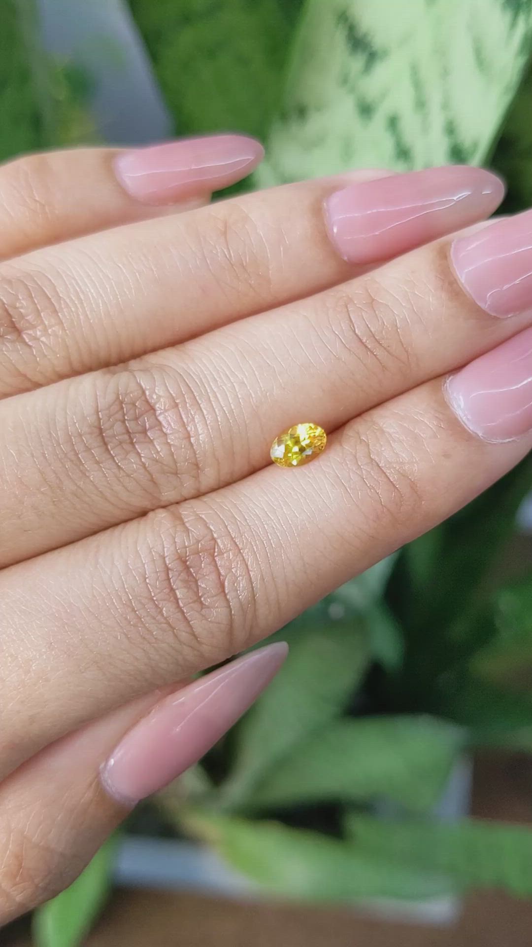 0.57 Ct. Orangish Yellow Sapphire from Ceylon (Sri Lanka) Size Video