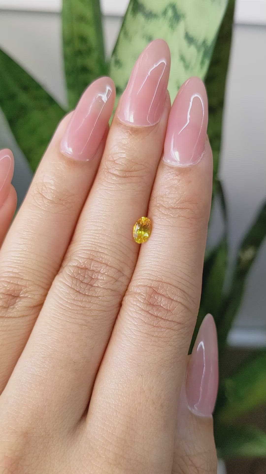 0.57 Ct. Orangish Yellow Sapphire from Ceylon (Sri Lanka) Size Video