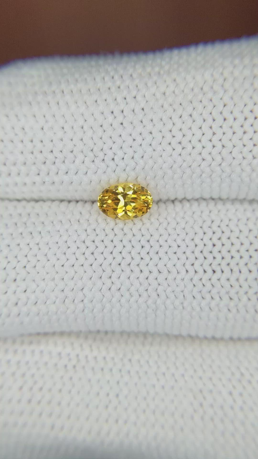0.63 Ct. Orangish Yellow Sapphire from Ceylon (Sri Lanka) Size Video