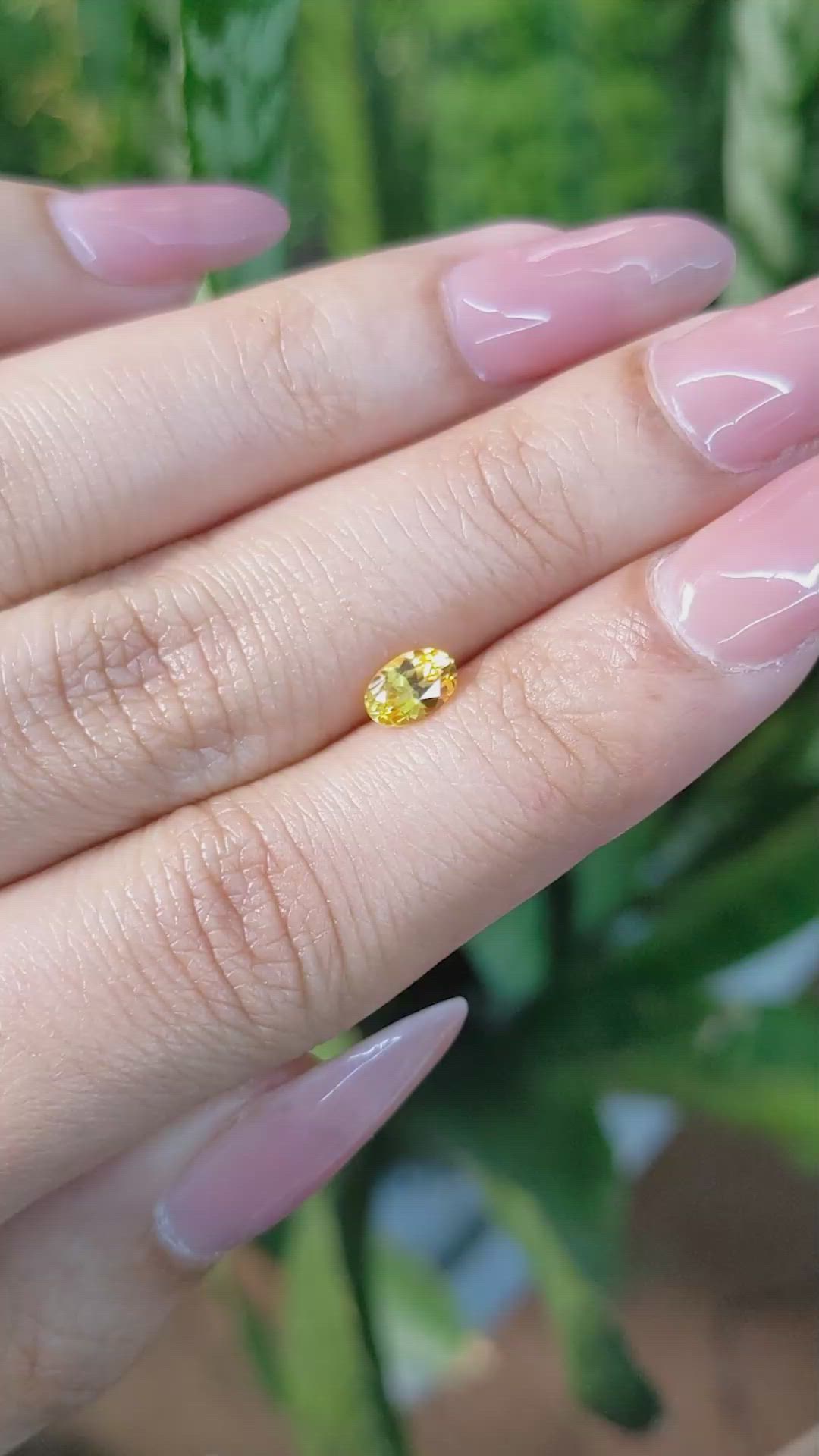 0.63 Ct. Orangish Yellow Sapphire from Ceylon (Sri Lanka) Size Video