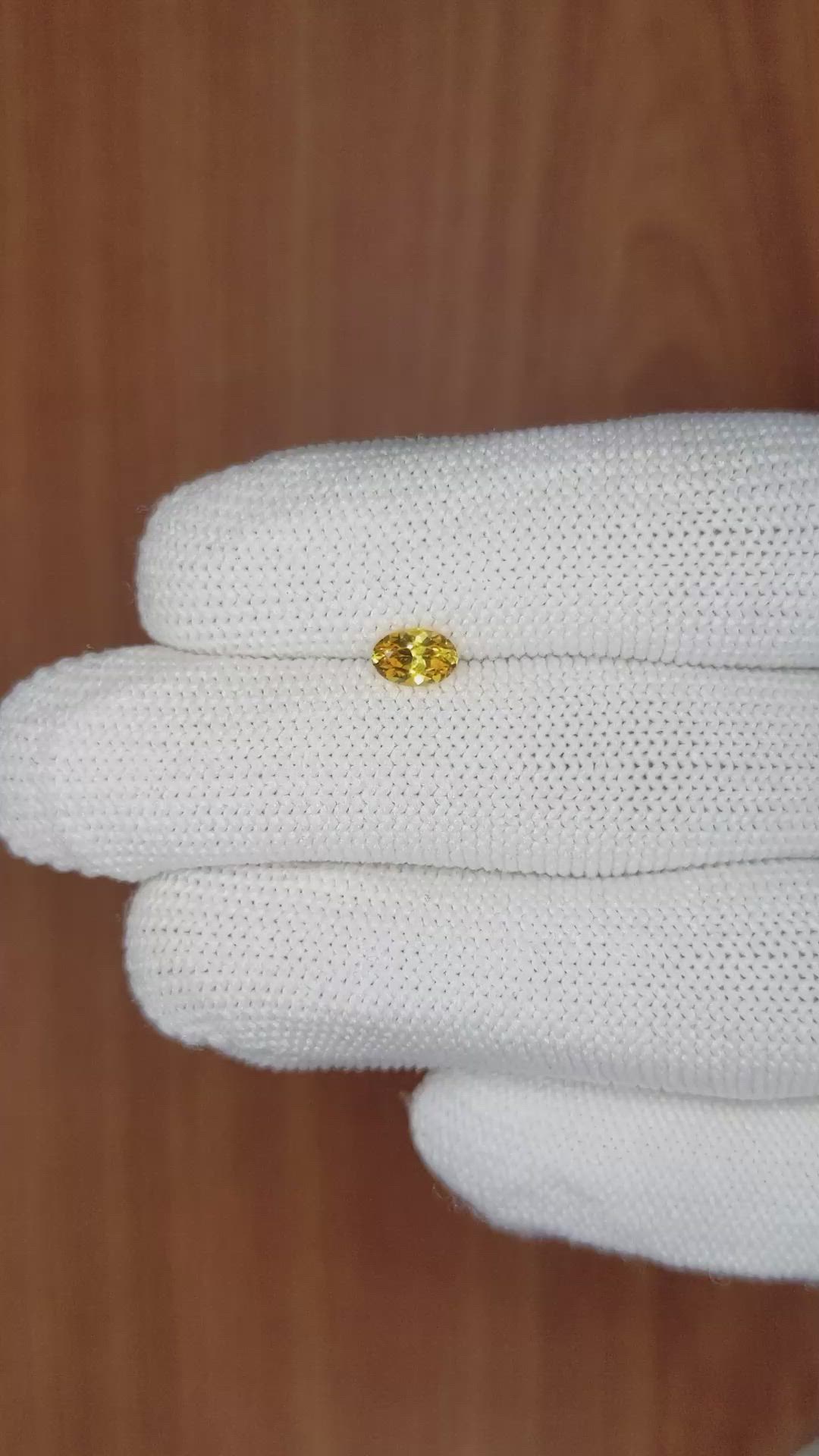 0.63 Ct. Orangish Yellow Sapphire from Ceylon (Sri Lanka) Size Video
