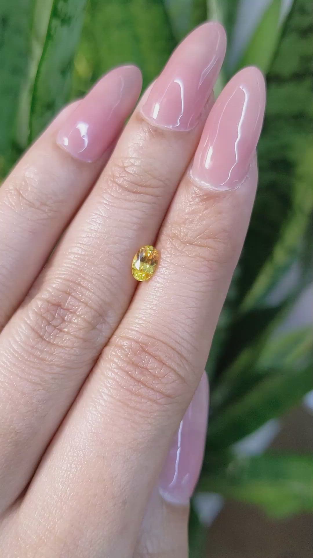 0.63 Ct. Orangish Yellow Sapphire from Ceylon (Sri Lanka) Size Video