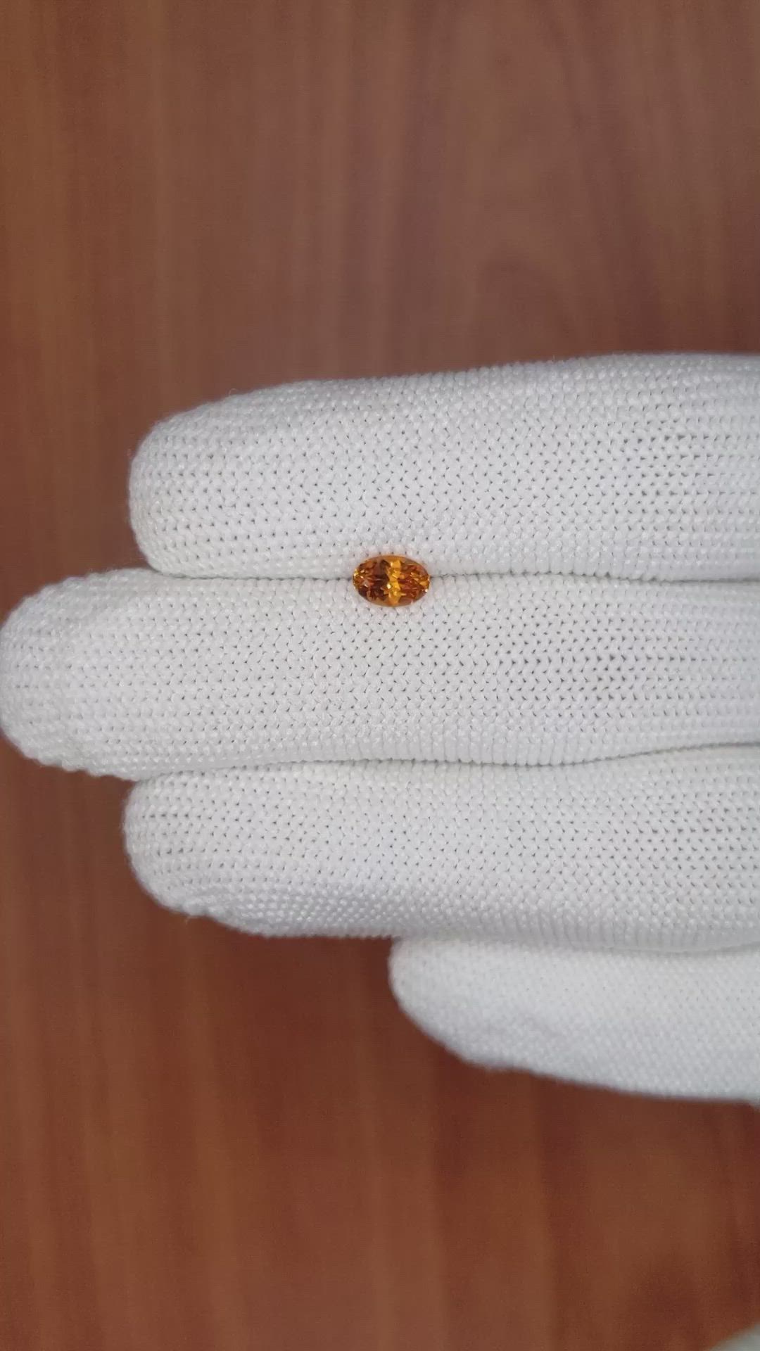 0.61 Ct. Yellowish Orange Sapphire from Ceylon (Sri Lanka) Size Video