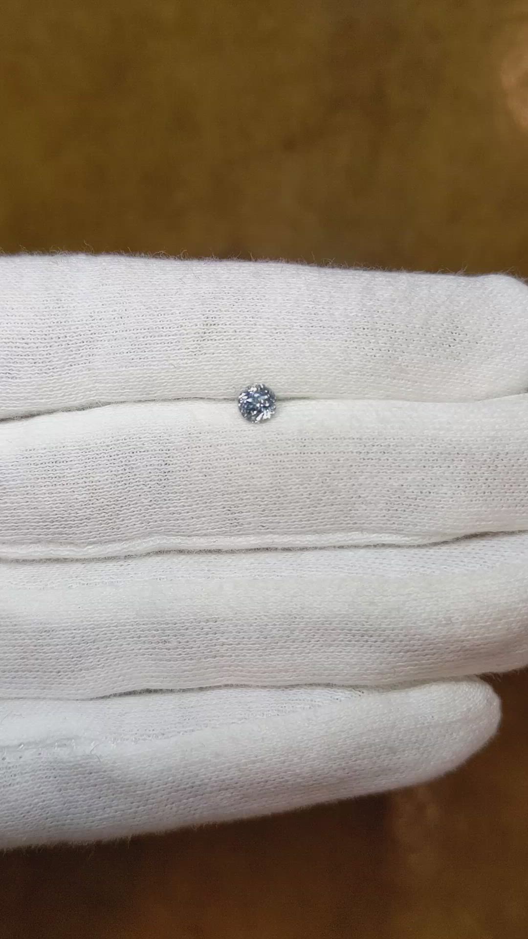 0.48 Ct. Greyish Blue Sapphire from Montana Size Video