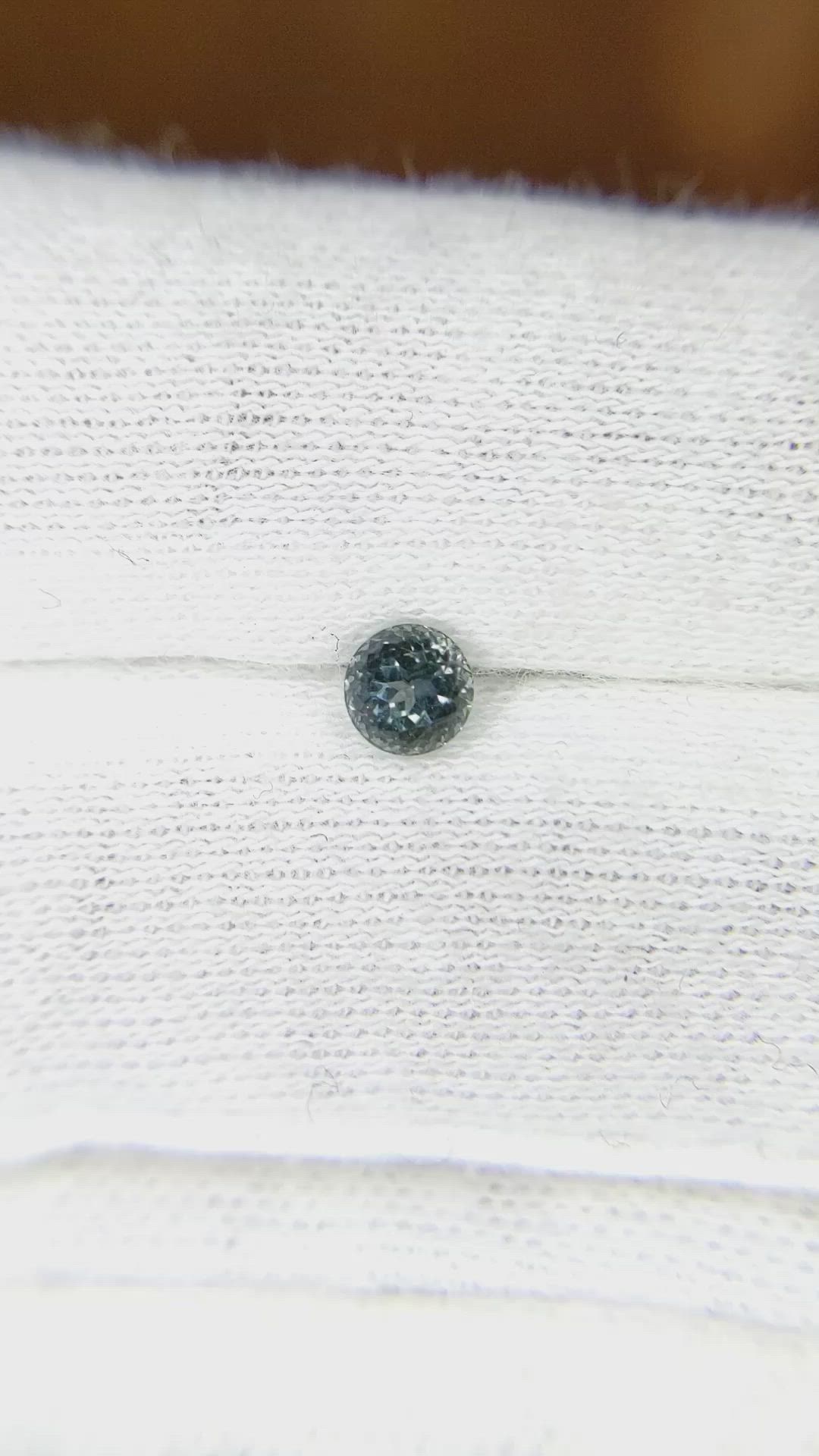 0.48 Ct. Greyish Blue Sapphire from Montana Size Video