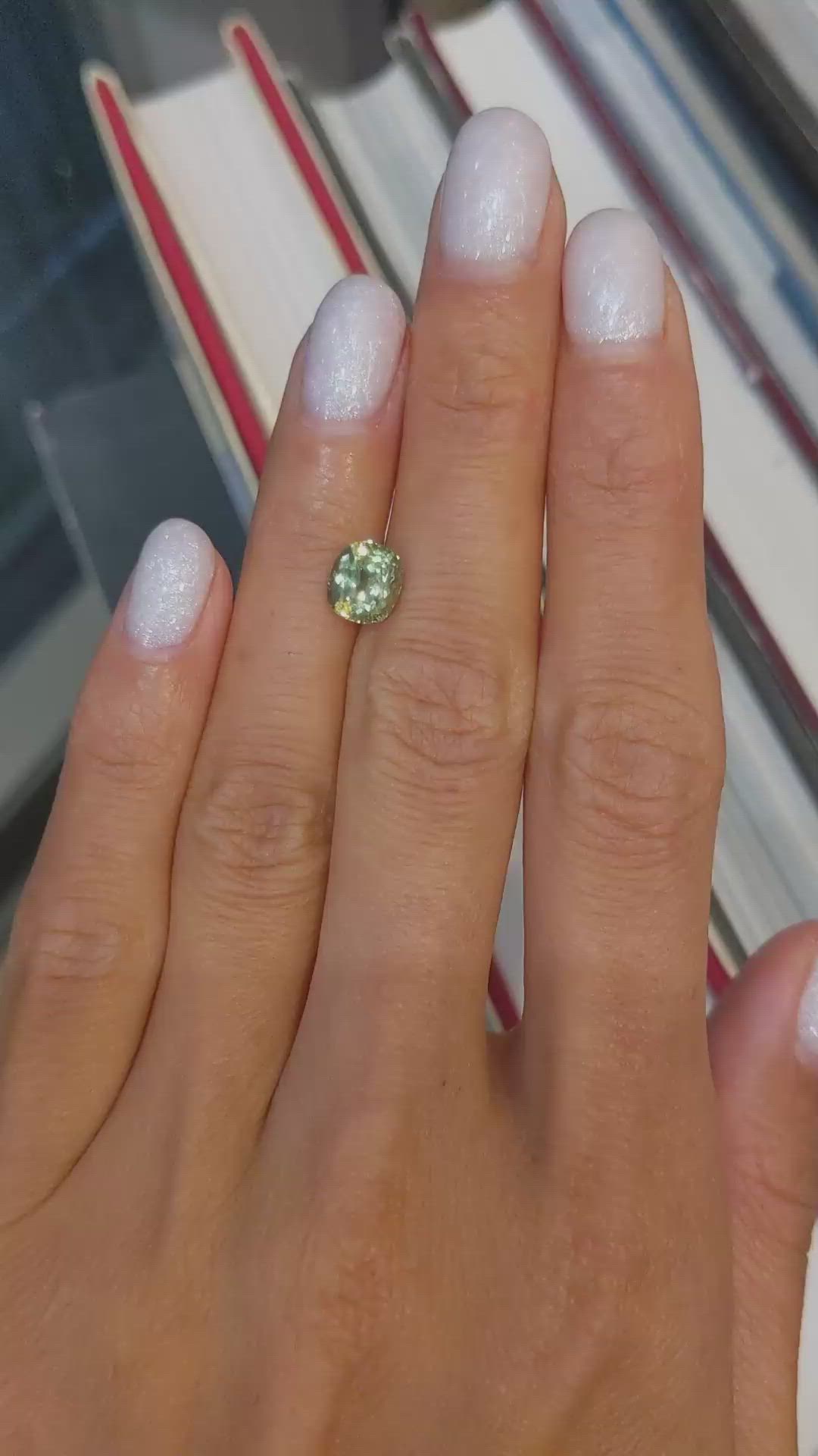 1.74 Ct. Yellowish Green Sapphire from Montana Size Video