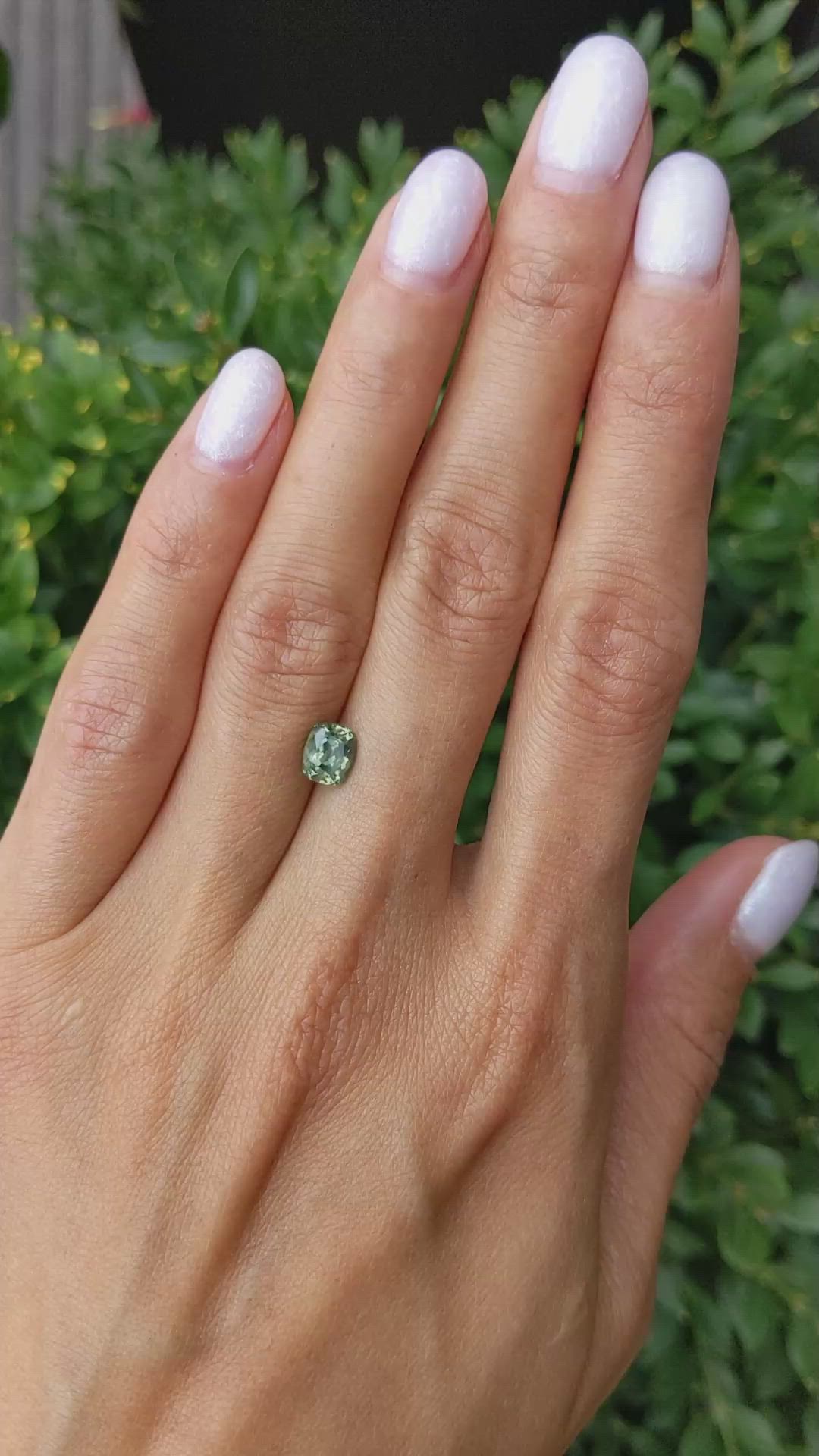 1.21 Ct. Yellowish Green Sapphire from Montana Size Video