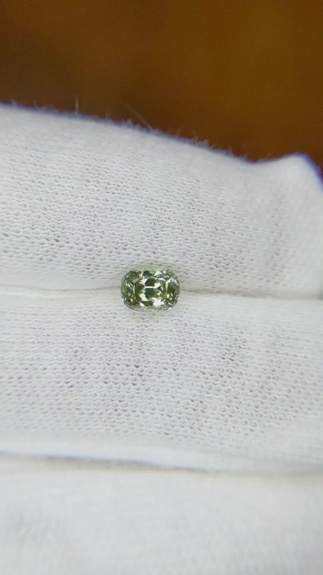 0.73 Ct. Yellowish Green Sapphire from Montana Size Video