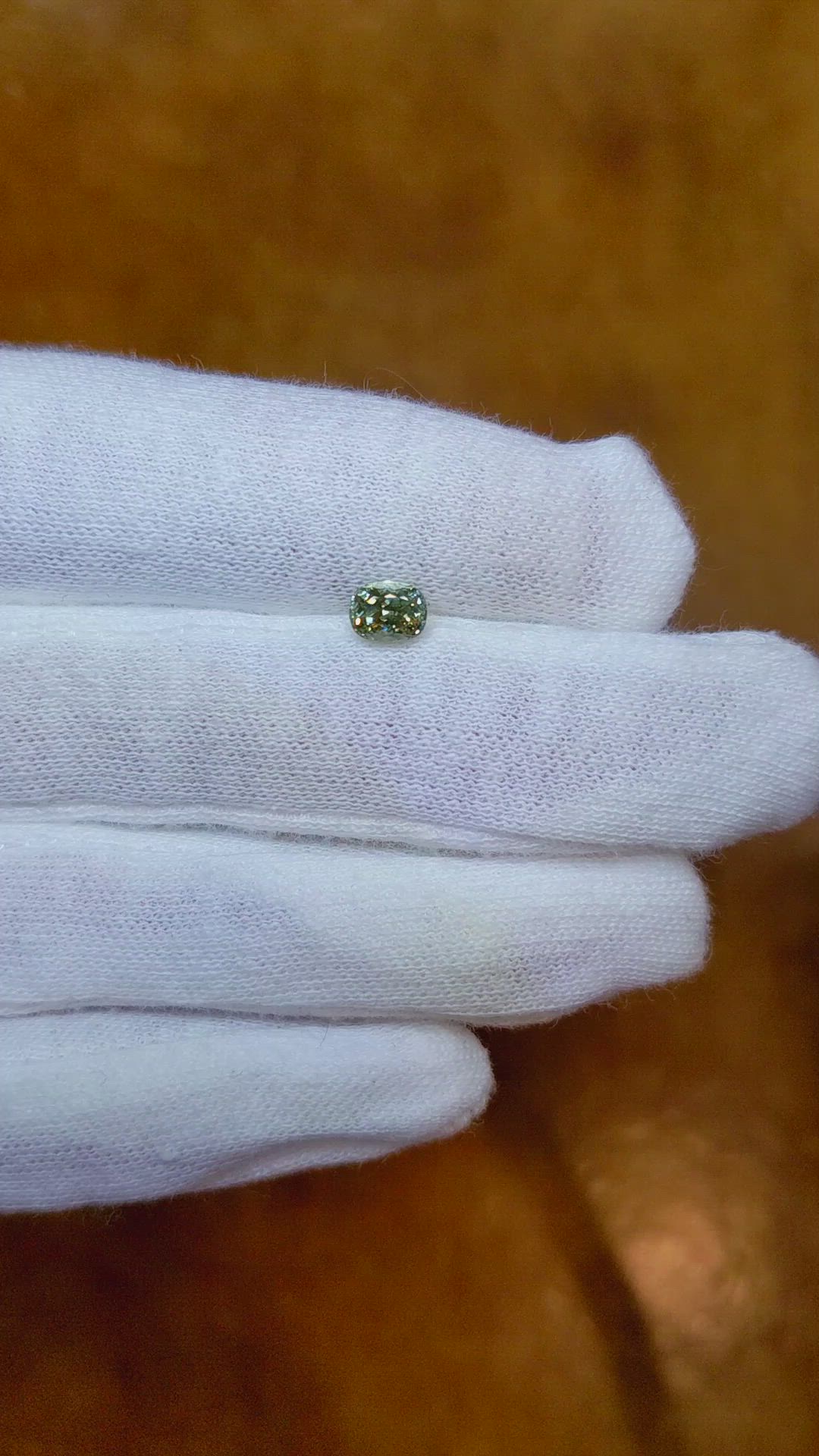 0.73 Ct. Yellowish Green Sapphire from Montana Size Video