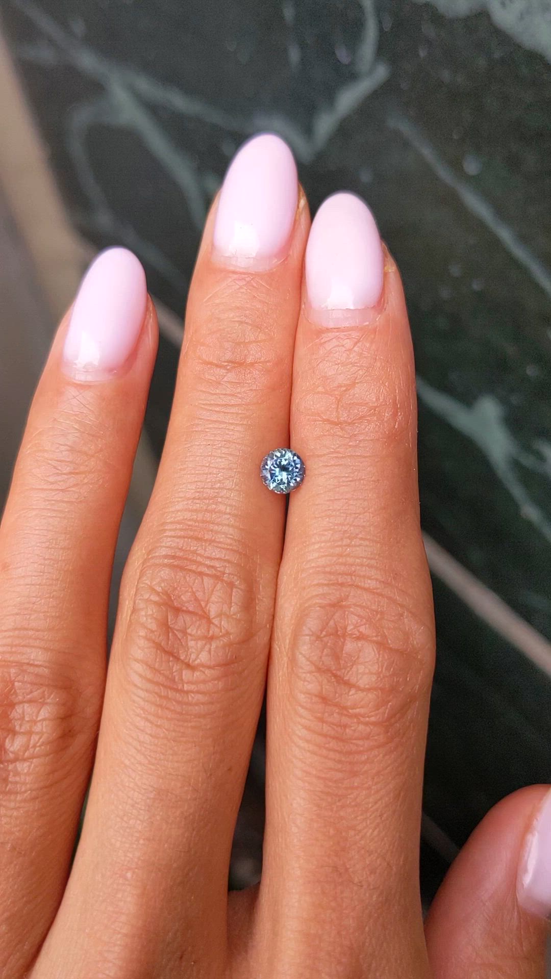 0.61 Ct. Greenish Blue Sapphire from Montana Size Video